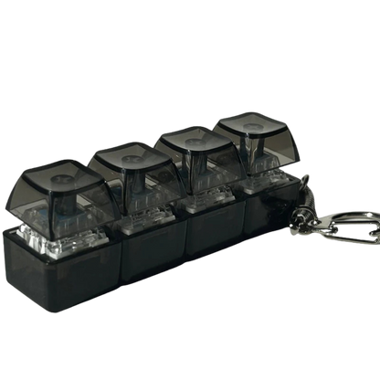 Llavero Teclado Antiestrés LED